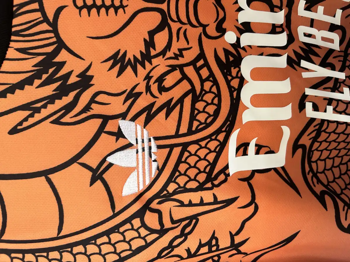 2025 2026 real madrid dragon edition orange soccer jersey 6
