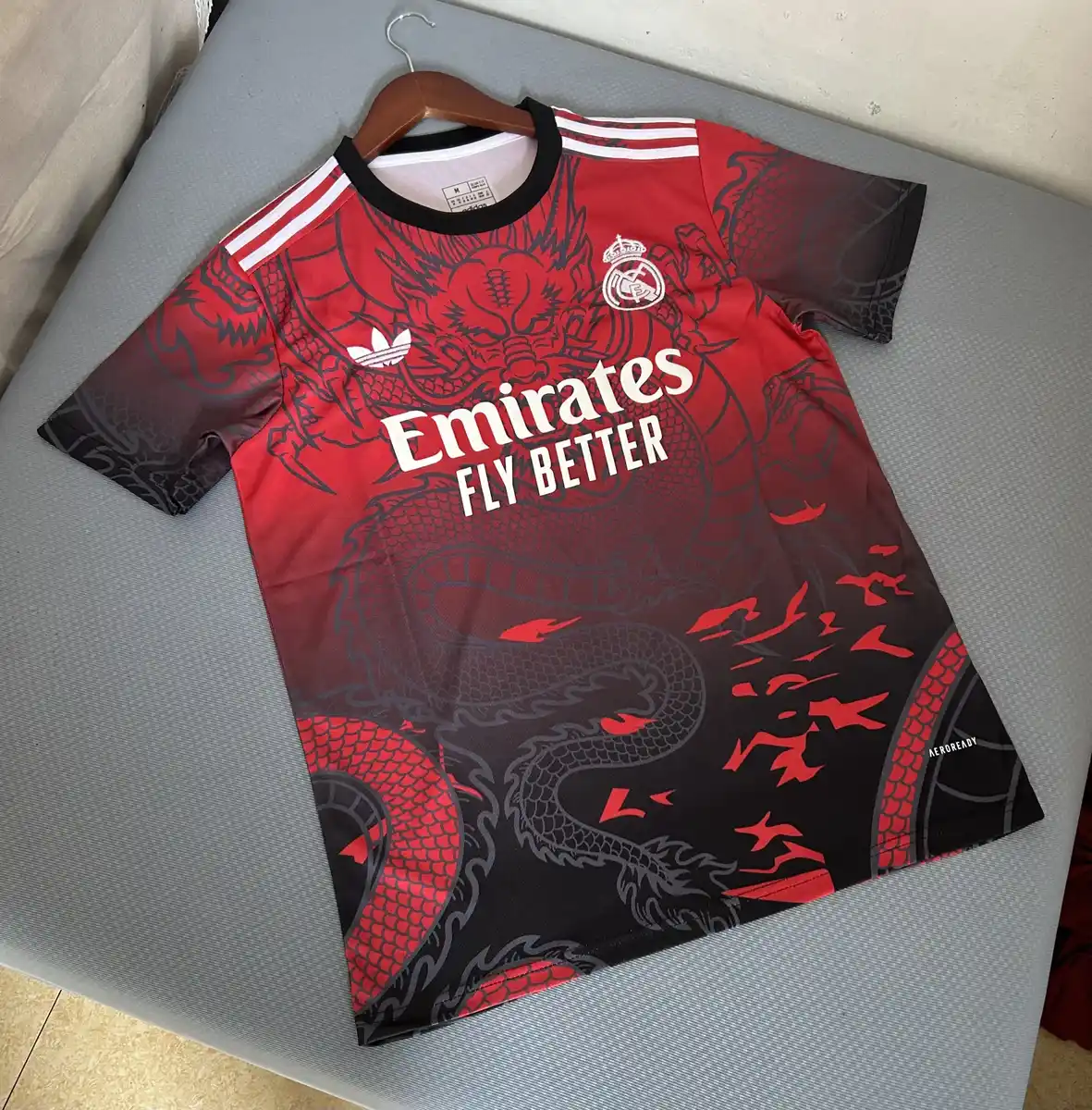 2025 2026 real madrid dragon edition red soccer jersey 1
