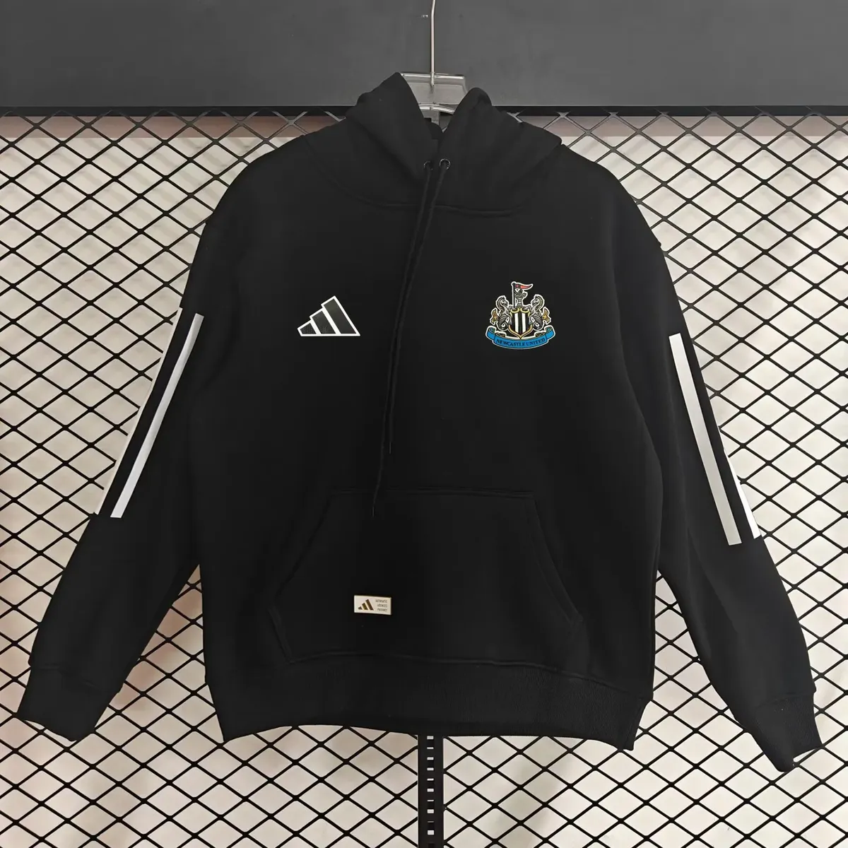 2025 newcastle united fleece lined hoodie home 1